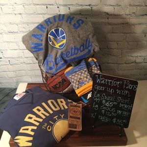 Warrior gear prices listed on the board the photos